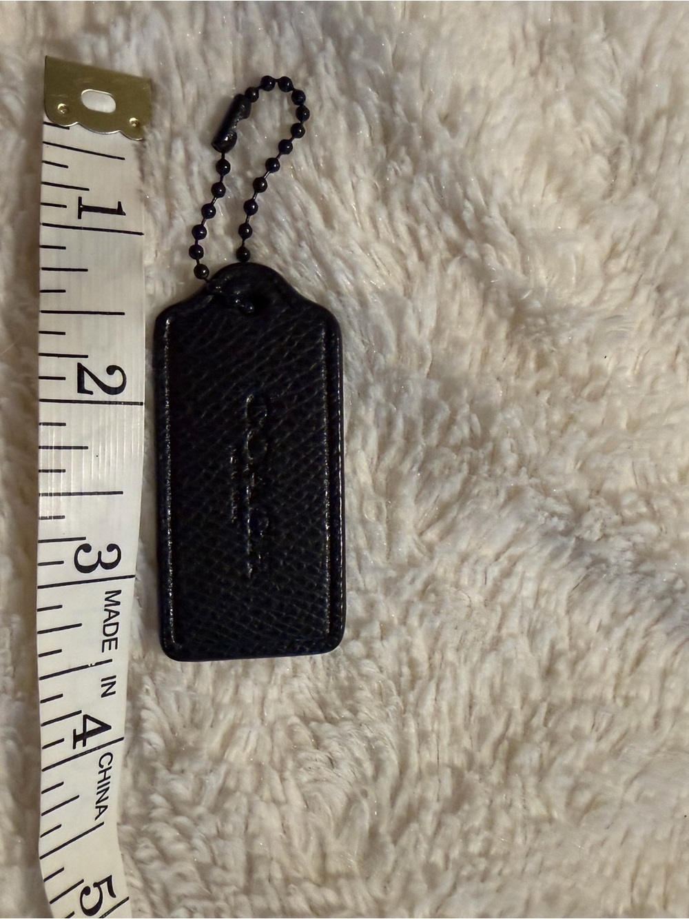 Coach Hang Tag